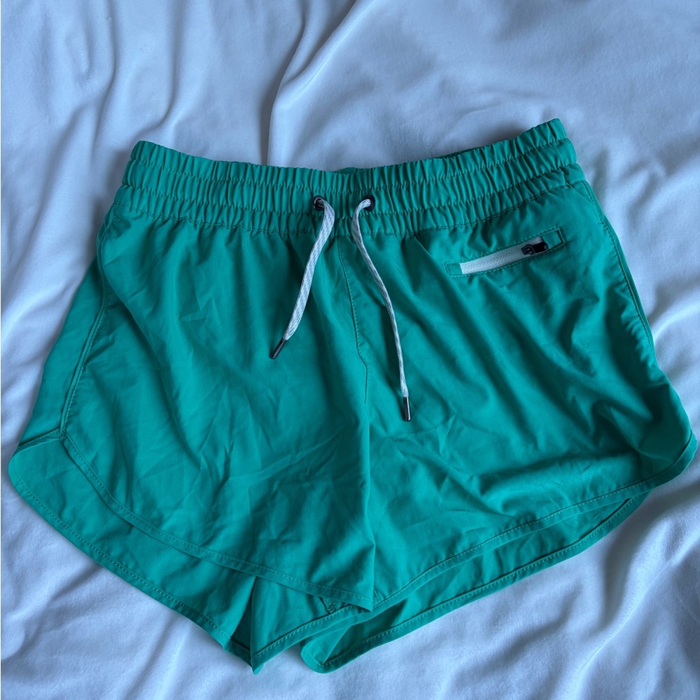 Green vuori running shorts